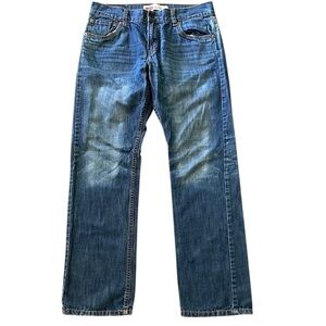 Levi’s 513 slim straight distressed blue jeans